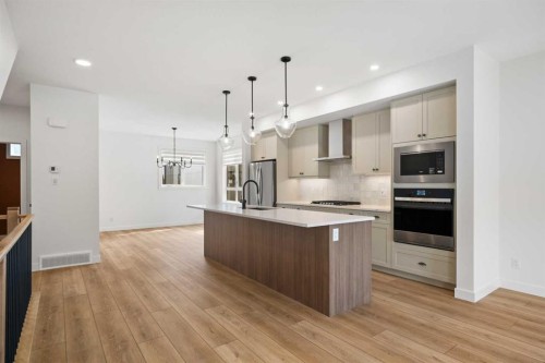 8349 8 Avenue Sw, Calgary, AB - Indoor Photo Showing Kitchen With Upgraded Kitchen