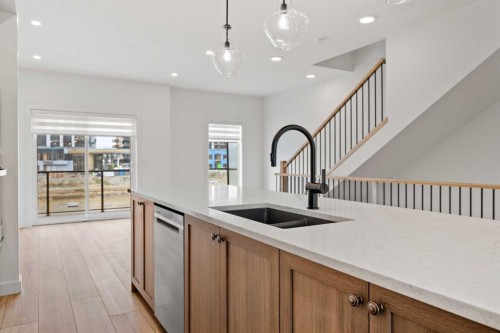 8349 8 Avenue Sw, Calgary, AB - Indoor Photo Showing Kitchen With Double Sink