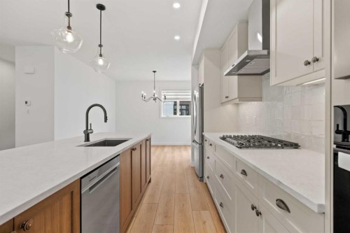 8349 8 Avenue Sw, Calgary, AB - Indoor Photo Showing Kitchen With Upgraded Kitchen
