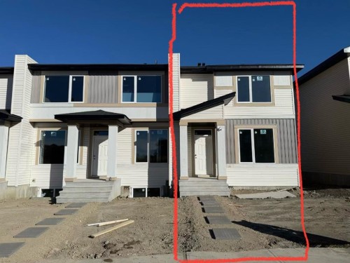 1995 Mccaskill Drive, Crossfield, AB - Outdoor With Facade