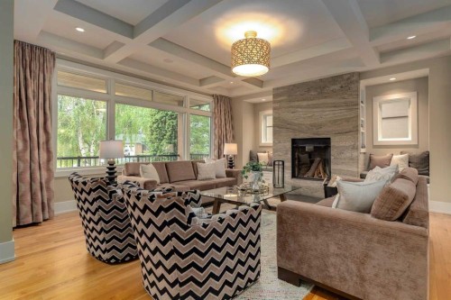 16 Varal Place Nw, Calgary, AB - Indoor Photo Showing Living Room With Fireplace