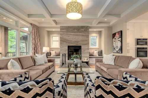 16 Varal Place Nw, Calgary, AB - Indoor Photo Showing Living Room With Fireplace