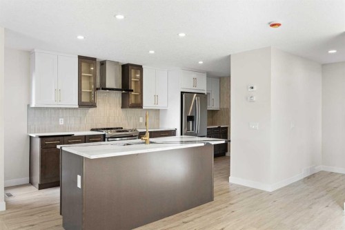 20-1220 Prominence Way Sw, Calgary, AB - Indoor Photo Showing Kitchen With Upgraded Kitchen