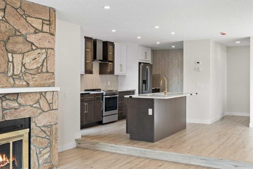 20-1220 Prominence Way Sw, Calgary, AB - Indoor Photo Showing Kitchen With Upgraded Kitchen