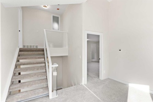 20-1220 Prominence Way Sw, Calgary, AB - Indoor Photo Showing Other Room