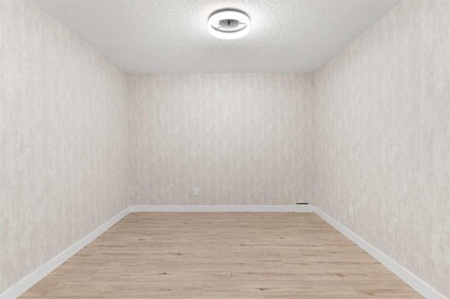 20-1220 Prominence Way Sw, Calgary, AB - Indoor Photo Showing Other Room
