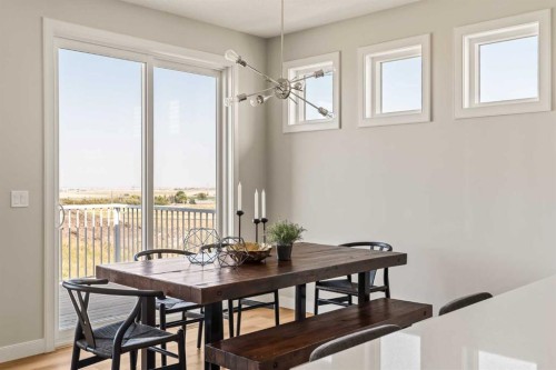1168 Iron Ridge Avenue, Crossfield, AB - Indoor Photo Showing Dining Room