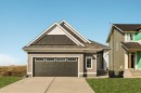 1168 Iron Ridge Avenue, Crossfield, AB  - Outdoor With Facade 