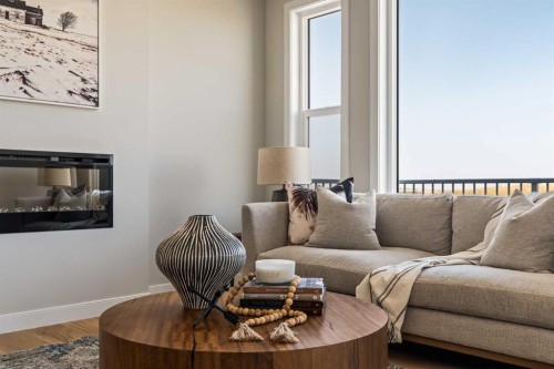 1168 Iron Ridge Avenue, Crossfield, AB - Indoor Photo Showing Living Room