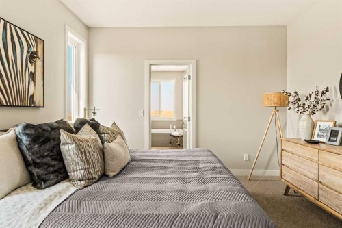 1168 Iron Ridge Avenue, Crossfield, AB - Indoor Photo Showing Bedroom