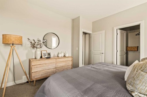 1168 Iron Ridge Avenue, Crossfield, AB - Indoor Photo Showing Bedroom