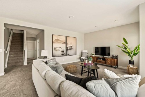 1168 Iron Ridge Avenue, Crossfield, AB - Indoor Photo Showing Living Room