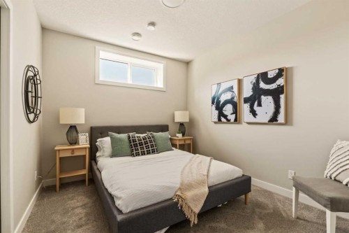 1168 Iron Ridge Avenue, Crossfield, AB - Indoor Photo Showing Bedroom