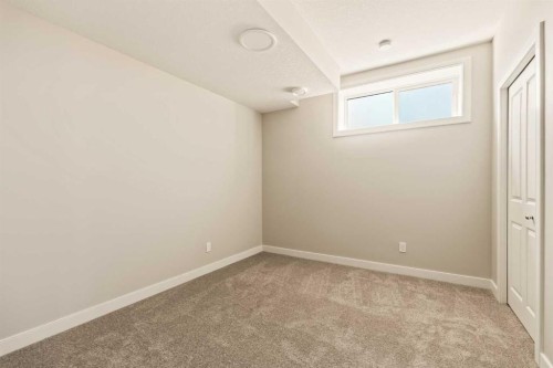 1168 Iron Ridge Avenue, Crossfield, AB - Indoor Photo Showing Other Room