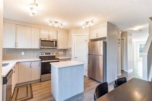 1016-7451 Falconridge Boulevard Ne, Calgary, AB - Indoor Photo Showing Kitchen