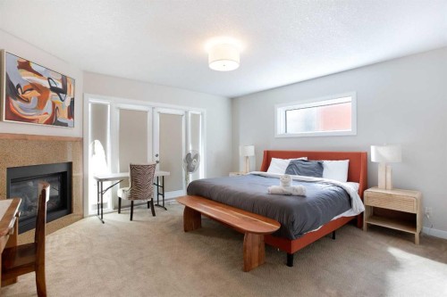 102-814 Memorial Drive Nw, Calgary, AB - Indoor Photo Showing Bedroom