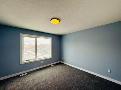 1999 Mccaskill Drive, Crossfield, AB - Indoor Photo Showing Other Room