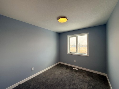 1999 Mccaskill Drive, Crossfield, AB - Indoor Photo Showing Other Room