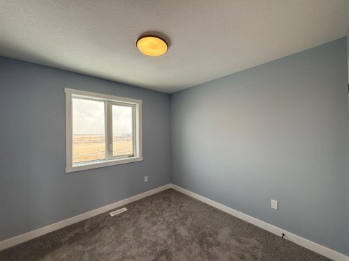 1999 Mccaskill Drive, Crossfield, AB - Indoor Photo Showing Other Room