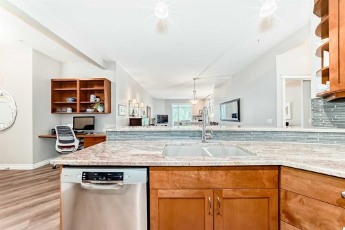 7204-14 Hemlock Crescent Sw, Calgary, AB - Indoor Photo Showing Kitchen With Double Sink With Upgraded Kitchen