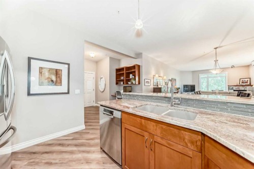 7204-14 Hemlock Crescent Sw, Calgary, AB - Indoor Photo Showing Kitchen With Double Sink