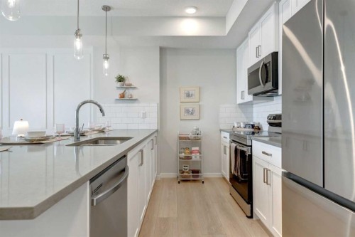 1111-15126 37 Street Sw, Calgary, AB - Indoor Photo Showing Kitchen With Upgraded Kitchen
