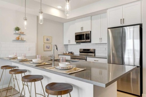 1111-15126 37 Street Sw, Calgary, AB - Indoor Photo Showing Kitchen With Upgraded Kitchen