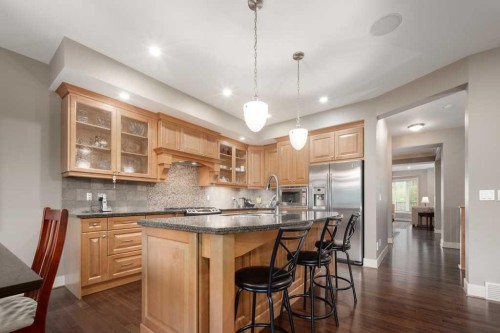 24 Aspen Meadows Green Sw, Calgary, AB - Indoor Photo Showing Kitchen With Upgraded Kitchen
