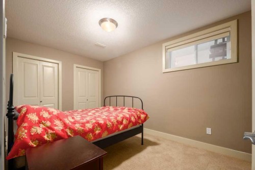 24 Aspen Meadows Green Sw, Calgary, AB - Indoor Photo Showing Bedroom