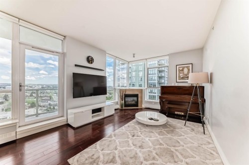 1907-77 Spruce Place Sw, Calgary, AB - Indoor Photo Showing Living Room With Fireplace