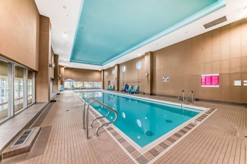 1907-77 Spruce Place Sw, Calgary, AB - Indoor Photo Showing Other Room With In Ground Pool
