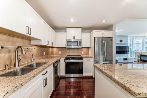 1907-77 Spruce Place Sw, Calgary, AB - Indoor Photo Showing Kitchen With Stainless Steel Kitchen With Double Sink With Upgraded Kitchen