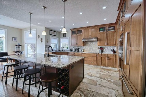 409 9 Street, Beiseker, AB - Indoor Photo Showing Kitchen With Upgraded Kitchen