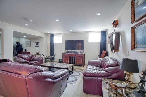 409 9 Street, Beiseker, AB - Indoor Photo Showing Living Room