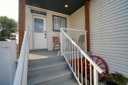409 9 Street, Beiseker, AB - Outdoor With Deck Patio Veranda With Exterior