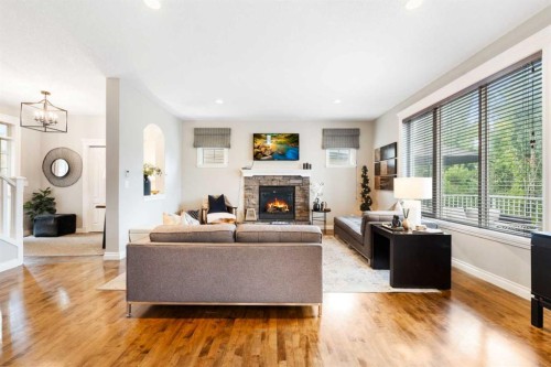 20 Auburn Sound Terrace Se, Calgary, AB - Indoor Photo Showing Living Room With Fireplace