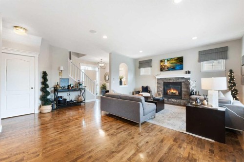 20 Auburn Sound Terrace Se, Calgary, AB - Indoor Photo Showing Living Room With Fireplace