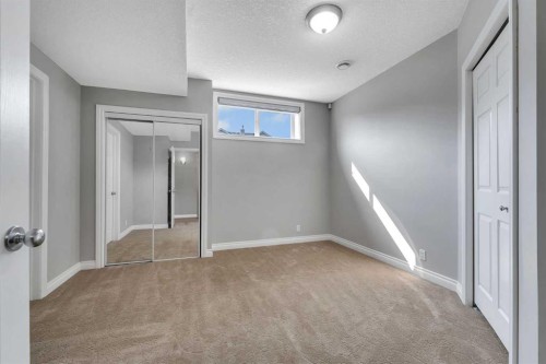 202 Coral Reef Manor Ne, Calgary, AB - Indoor Photo Showing Other Room