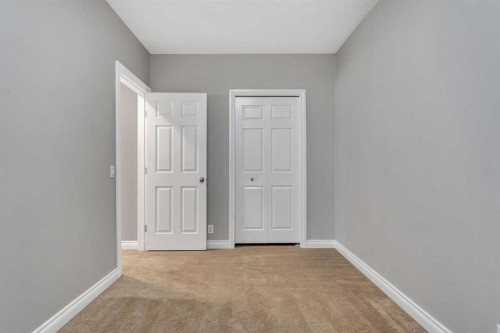 202 Coral Reef Manor Ne, Calgary, AB - Indoor Photo Showing Other Room