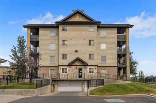 8328-304 Mackenzie Way Sw, Airdrie, AB - Outdoor With Balcony