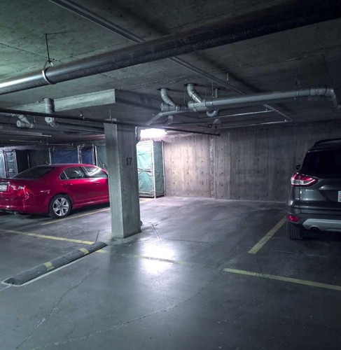 8328-304 Mackenzie Way Sw, Airdrie, AB - Indoor Photo Showing Garage