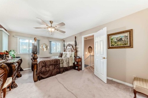983 Woodbine Boulevard Sw, Calgary, AB - Indoor Photo Showing Bedroom