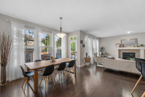 86 Auburn Glen Circle Se, Calgary, AB - Indoor Photo Showing Dining Room With Fireplace