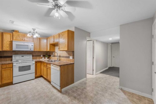 86 Auburn Glen Circle Se, Calgary, AB - Indoor Photo Showing Kitchen With Double Sink