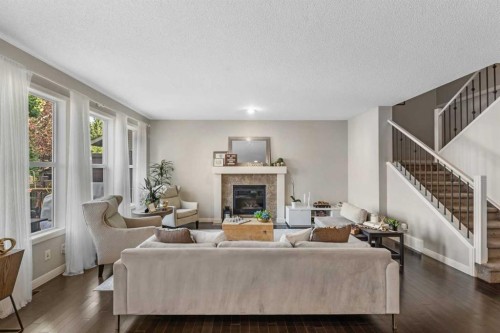 86 Auburn Glen Circle Se, Calgary, AB - Indoor Photo Showing Living Room With Fireplace