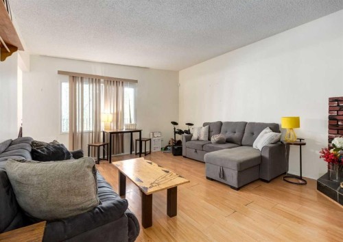 70 Allandale Close Se, Calgary, AB - Indoor Photo Showing Living Room