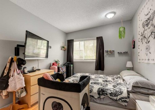 70 Allandale Close Se, Calgary, AB - Indoor Photo Showing Bedroom