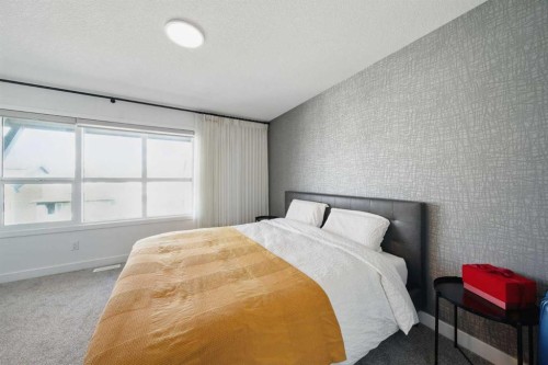 47 Edith Terrace Nw, Calgary, AB - Indoor Photo Showing Bedroom