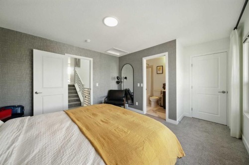 47 Edith Terrace Nw, Calgary, AB - Indoor Photo Showing Bedroom