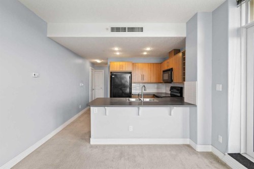 407-55 Spruce Place Sw, Calgary, AB - Indoor Photo Showing Kitchen